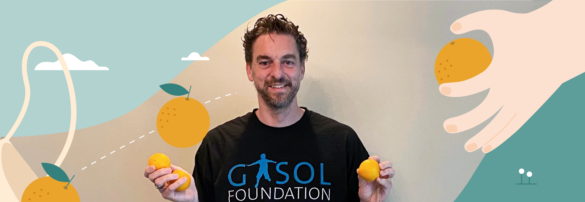 Pau Gasol with oranges in his hands